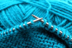 Boye Knitting Needles - Complete Review - The Creative Folk Metal knitting needles working a turquoise wool swatch